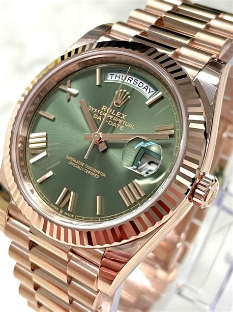 rolex day date rose gold price